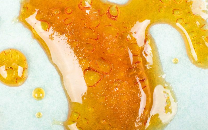 strong extract of gold cannabis wax with high thc close up